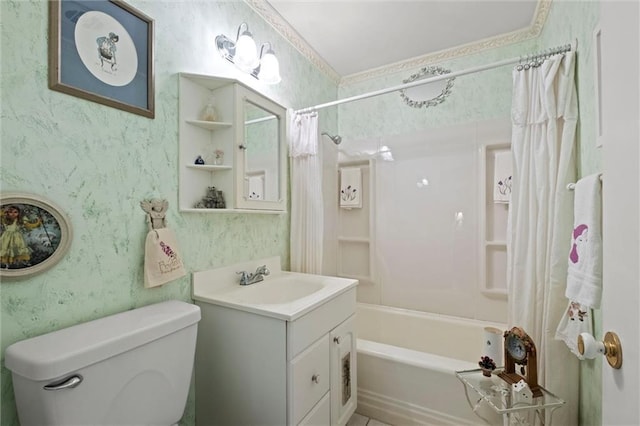bathroom featuring wallpapered walls, shower / tub combo with curtain, vanity, and toilet