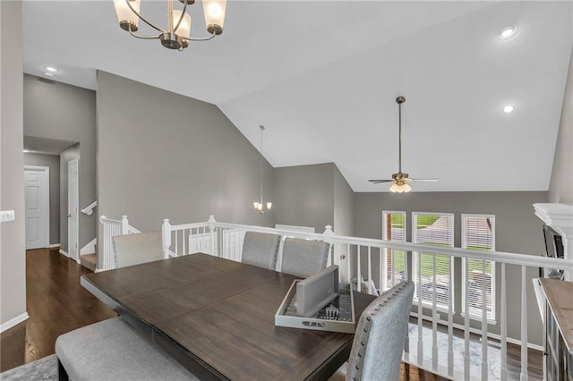 16754 W 156th Ter, Olathe, KS 66062 - dining room featuring a chandelier, vaulted ceiling, wood finished floors, baseboards, and a ceiling fan