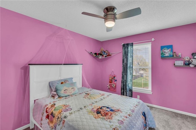 16754 W 156th Ter, Olathe, KS 66062 - carpeted bedroom with a ceiling fan, baseboards, and a textured ceiling