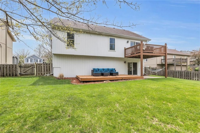 16754 W 156th Ter, Olathe, KS 66062 - back of house with a wooden deck, an outdoor living space, and a gate