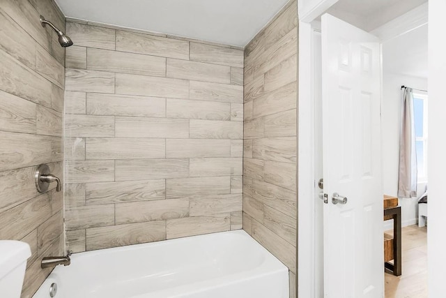 bathroom with shower / washtub combination