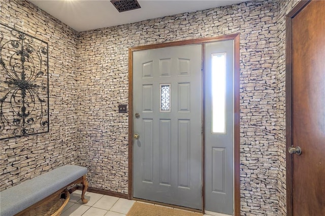 24101 E 223rd St, Harrisonville, MO 64701 - foyer entrance featuring light tile patterned flooring, visible vents, and a healthy amount of sunlight