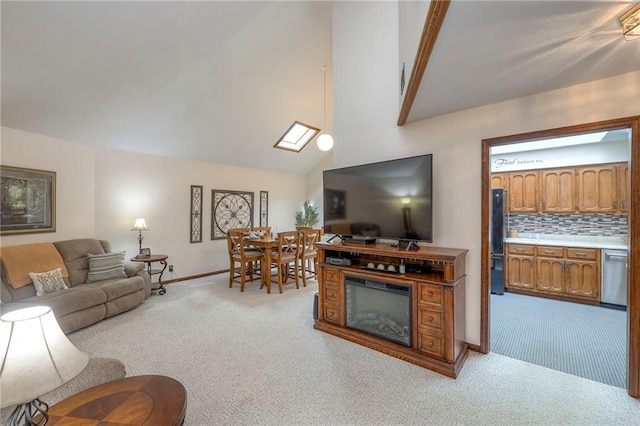 24101 E 223rd St, Harrisonville, MO 64701 - living area with baseboards, carpet flooring, and lofted ceiling