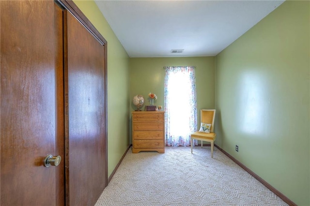 24101 E 223rd St, Harrisonville, MO 64701 - sitting room featuring visible vents, baseboards, and light carpet