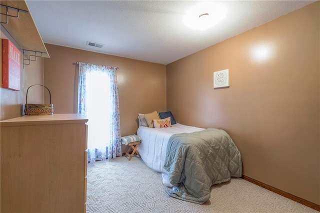24101 E 223rd St, Harrisonville, MO 64701 - bedroom with light colored carpet and visible vents