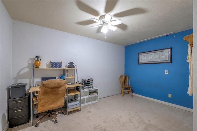 24101 E 223rd St, Harrisonville, MO 64701 - carpeted home office with baseboards, a ceiling fan, and a textured ceiling