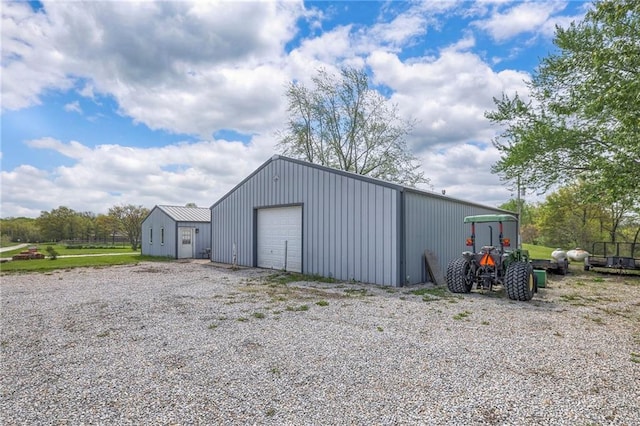 24101 E 223rd St, Harrisonville, MO 64701 - view of pole building with driveway