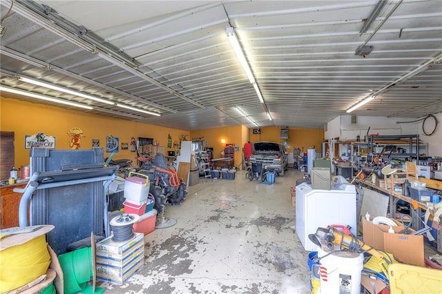 24101 E 223rd St, Harrisonville, MO 64701 - garage with washer / dryer