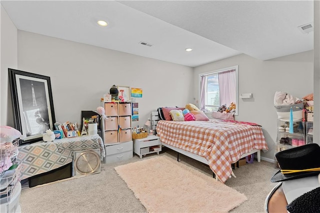 carpeted bedroom featuring visible vents and recessed lighting