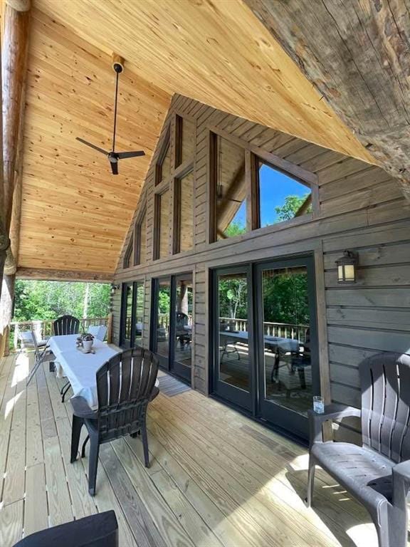 185 SW 51st Rd, Warrensburg, MO 64093 - wooden deck with french doors, outdoor dining space, and ceiling fan