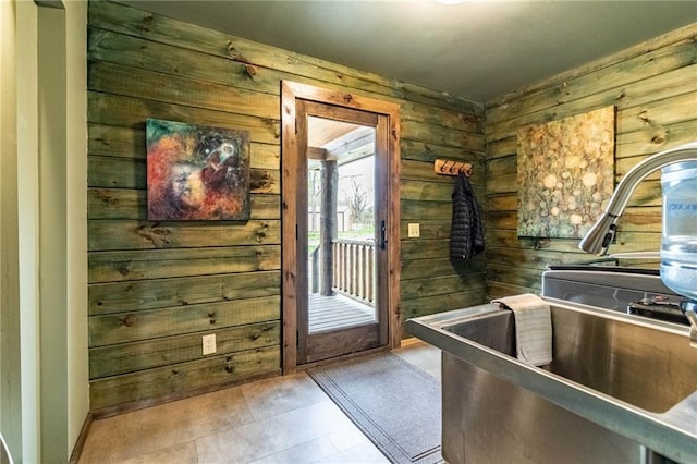 185 SW 51st Rd, Warrensburg, MO 64093 - doorway featuring wooden walls and a sink