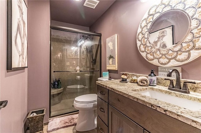 185 SW 51st Rd, Warrensburg, MO 64093 - full bath featuring toilet, a shower stall, vanity, and tile patterned floors