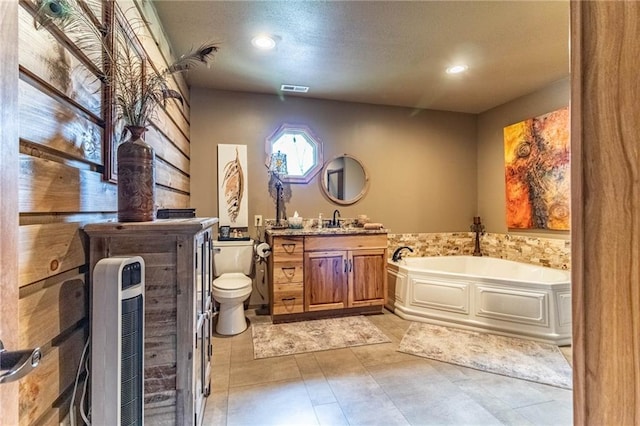 185 SW 51st Rd, Warrensburg, MO 64093 - full bath with toilet, a bath, vanity, and recessed lighting