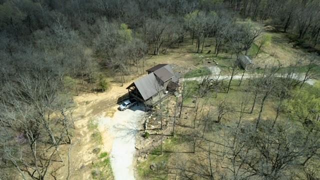 185 SW 51st Rd, Warrensburg, MO 64093 - view of property location with a heavily wooded area and rural landscape