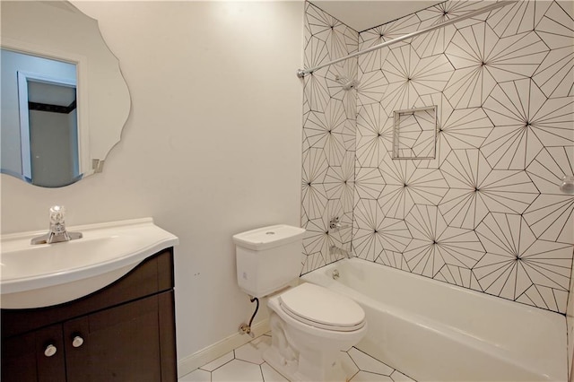bathroom featuring toilet, vanity, tile patterned flooring, tub / shower combination, and baseboards