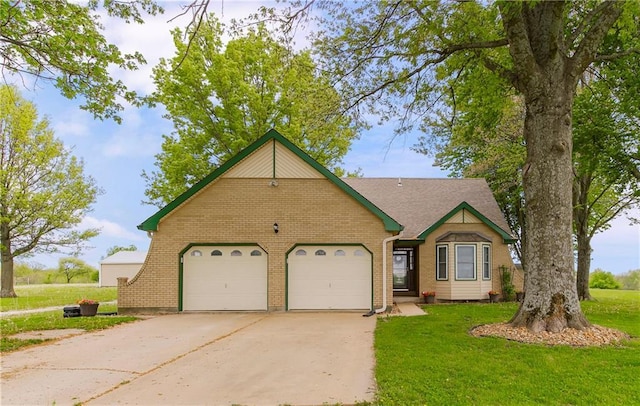 7622 Newton Rd, Odessa, MO 64076 - view of front of home featuring a garage, brick siding, driveway, and a front lawn