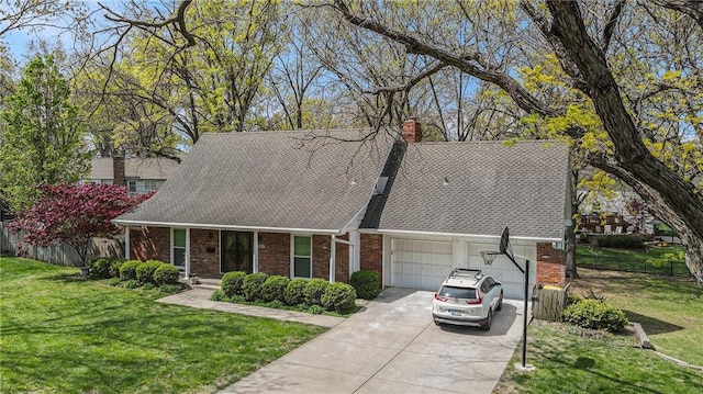 10100 El Monte St, Overland Park, KS 66207 - view of front facade with a front lawn, roof with shingles, a chimney, brick siding, and driveway