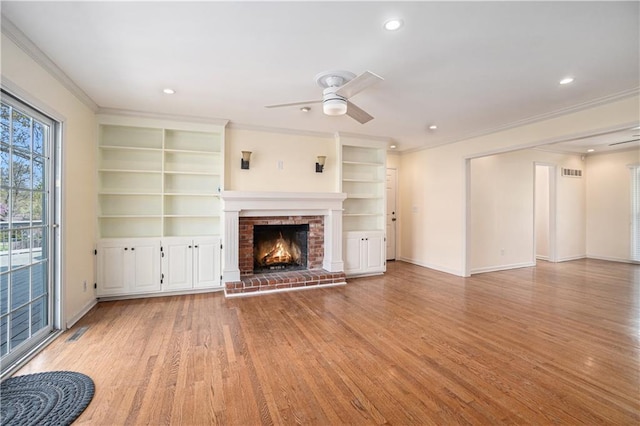 10100 El Monte St, Overland Park, KS 66207 - unfurnished living room with light wood-style floors, a ceiling fan, built in features, and ornamental molding