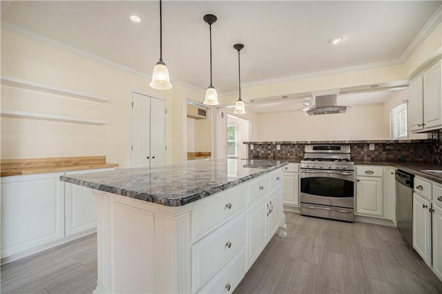 10100 El Monte St, Overland Park, KS 66207 - kitchen with backsplash, stainless steel appliances, white cabinetry, and dark stone counters