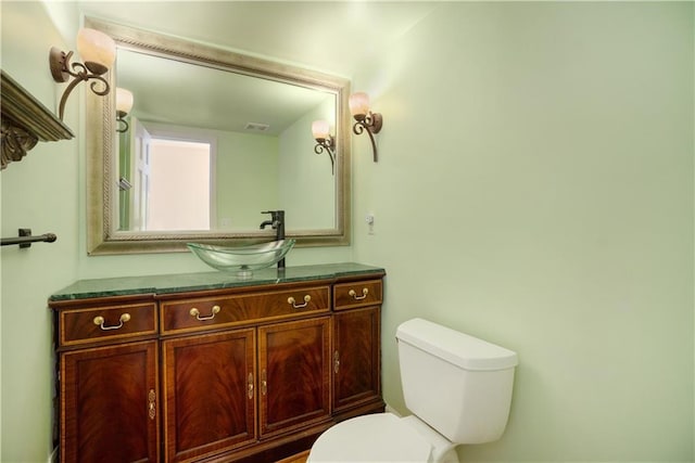 10100 El Monte St, Overland Park, KS 66207 - bathroom with vanity and toilet