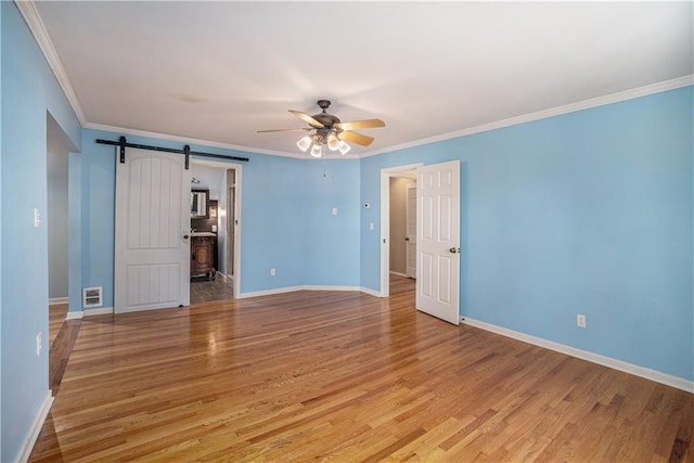 10100 El Monte St, Overland Park, KS 66207 - unfurnished room featuring crown molding, baseboards, ceiling fan, and light wood-style floors