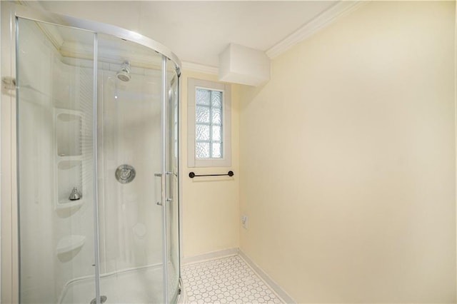 10100 El Monte St, Overland Park, KS 66207 - bathroom featuring baseboards, crown molding, and a shower stall