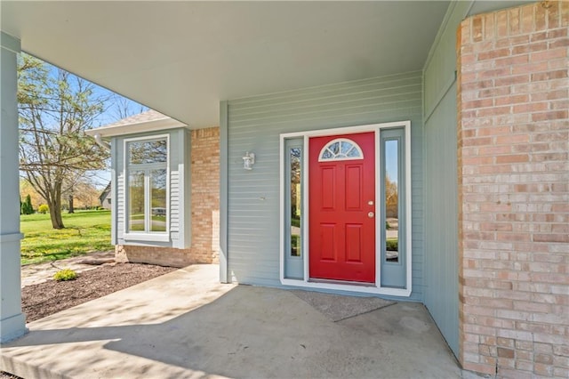 1010 SW Cross Creek Dr, Grain Valley, MO 64029 - entrance to property with brick siding