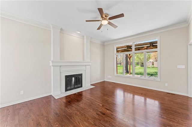 1010 SW Cross Creek Dr, Grain Valley, MO 64029 - unfurnished living room with ornamental molding, a ceiling fan, wood finished floors, and a large fireplace