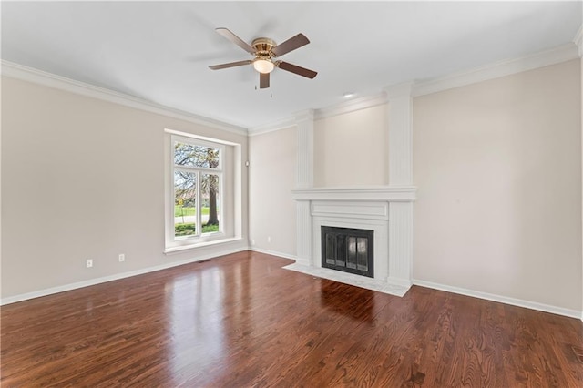 1010 SW Cross Creek Dr, Grain Valley, MO 64029 - unfurnished living room with baseboards, wood finished floors, ceiling fan, a fireplace, and ornamental molding