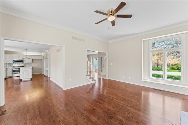1010 SW Cross Creek Dr, Grain Valley, MO 64029 - unfurnished living room with dark wood-style floors, baseboards, visible vents, a ceiling fan, and ornamental molding