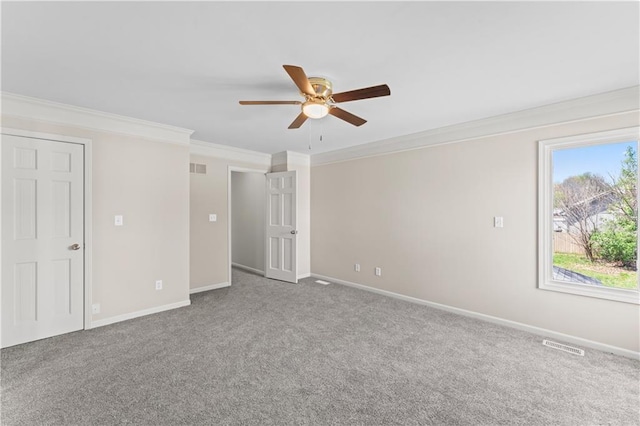 1010 SW Cross Creek Dr, Grain Valley, MO 64029 - unfurnished bedroom featuring baseboards, visible vents, carpet, ceiling fan, and crown molding