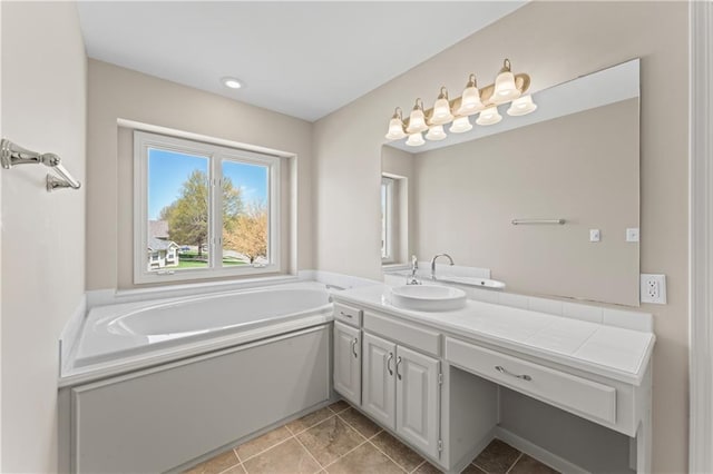 1010 SW Cross Creek Dr, Grain Valley, MO 64029 - full bathroom with a bath, vanity, and tile patterned flooring