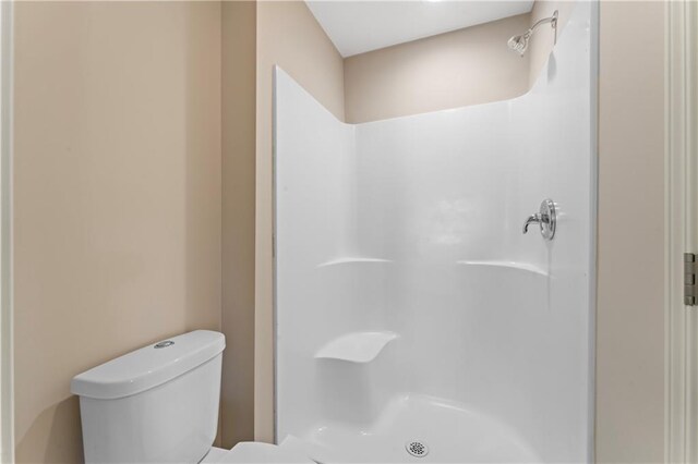 1010 SW Cross Creek Dr, Grain Valley, MO 64029 - full bathroom featuring toilet and a shower