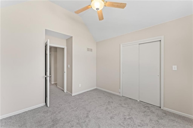1010 SW Cross Creek Dr, Grain Valley, MO 64029 - unfurnished bedroom with vaulted ceiling, visible vents, carpet floors, a closet, and baseboards
