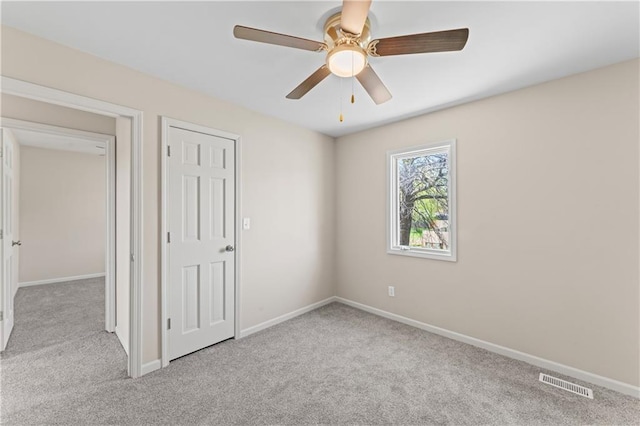 1010 SW Cross Creek Dr, Grain Valley, MO 64029 - unfurnished bedroom featuring baseboards, carpet flooring, and visible vents