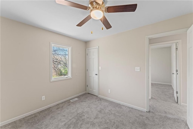 1010 SW Cross Creek Dr, Grain Valley, MO 64029 - unfurnished bedroom featuring visible vents, carpet flooring, baseboards, and ceiling fan