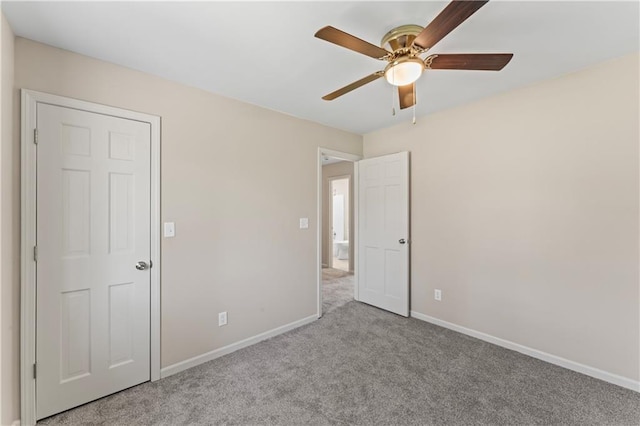 1010 SW Cross Creek Dr, Grain Valley, MO 64029 - unfurnished bedroom with carpet floors, a ceiling fan, and baseboards