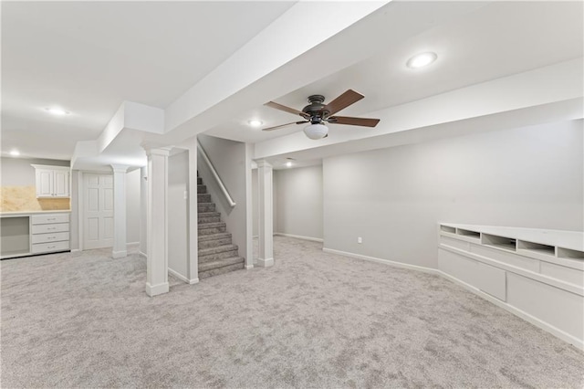 1010 SW Cross Creek Dr, Grain Valley, MO 64029 - finished basement with recessed lighting, stairway, a ceiling fan, baseboards, and light colored carpet