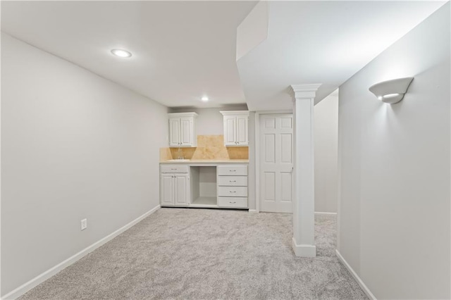 1010 SW Cross Creek Dr, Grain Valley, MO 64029 - basement featuring recessed lighting, baseboards, and light colored carpet
