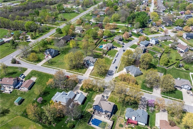 1010 SW Cross Creek Dr, Grain Valley, MO 64029 - aerial view with a residential view