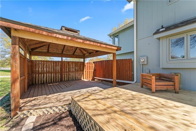 1010 SW Cross Creek Dr, Grain Valley, MO 64029 - wooden deck with fence and a gazebo