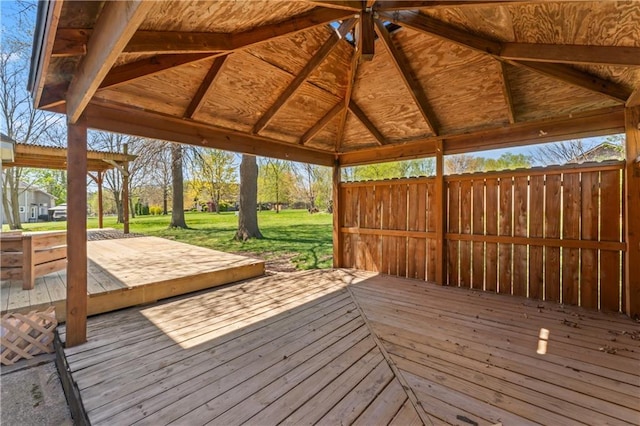 1010 SW Cross Creek Dr, Grain Valley, MO 64029 - wooden deck featuring a gazebo and a yard
