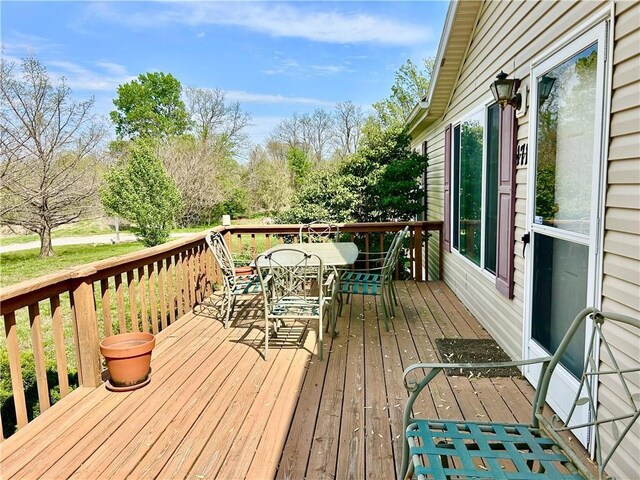 171 E 5th St, Schell City, MO 64783 - deck with outdoor dining space