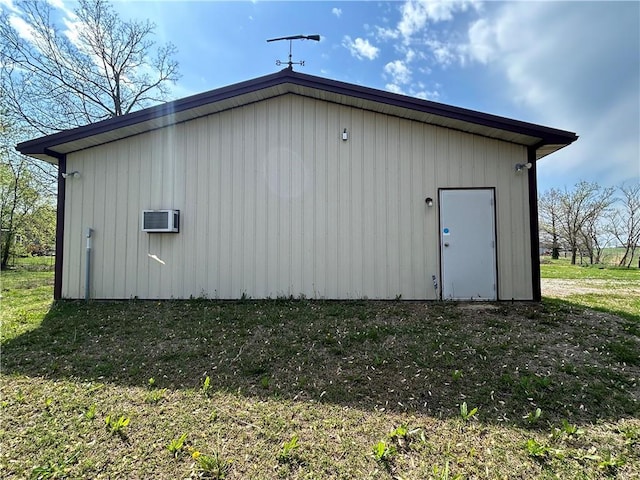 171 E 5th St, Schell City, MO 64783 - view of outdoor structure featuring a wall unit AC