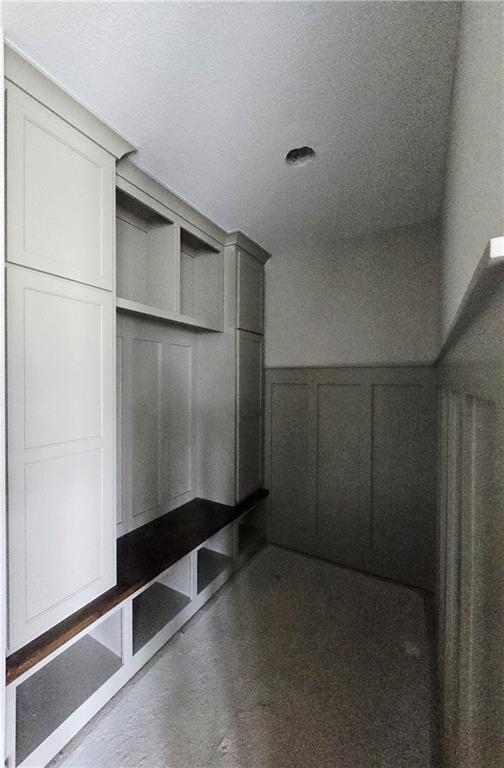 2615 SW Firefly Ln, Lees Summit, MO 64082 - mudroom with a decorative wall