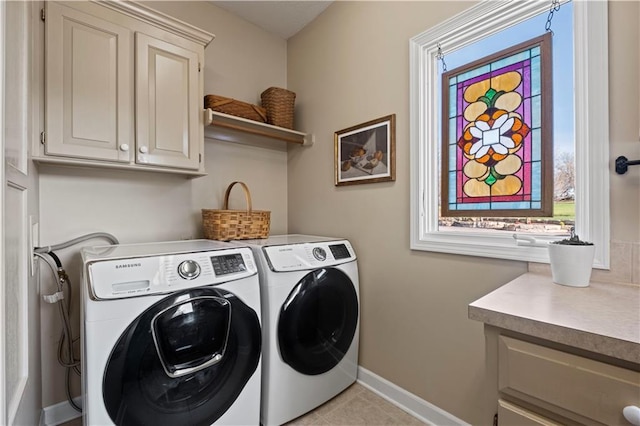 11250 W 191st St, Overland Park, KS 66083 - clothes washing area featuring separate washer and dryer, cabinet space, and baseboards