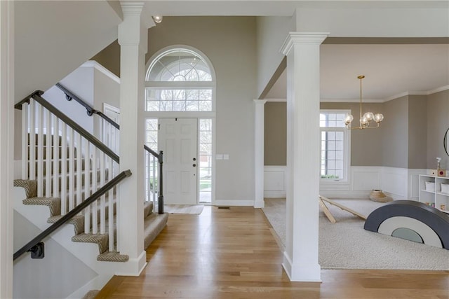 9500 N Lane Ave, Kansas City, MO 64157 - foyer entrance featuring a healthy amount of sunlight, stairway, and ornate columns
