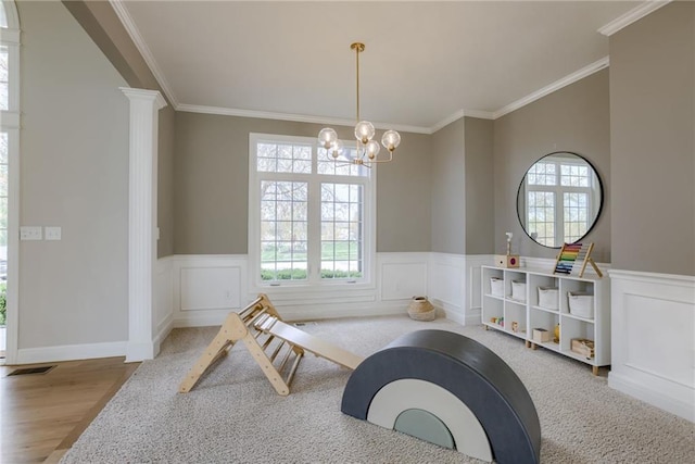 9500 N Lane Ave, Kansas City, MO 64157 - interior space with a healthy amount of sunlight, an inviting chandelier, and ornamental molding