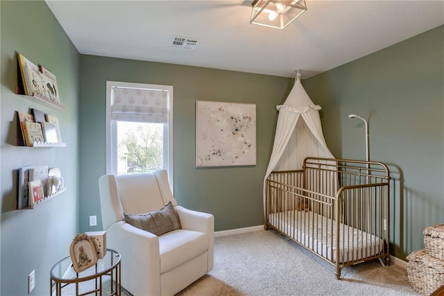 9500 N Lane Ave, Kansas City, MO 64157 - carpeted bedroom with visible vents, baseboards, and a nursery area