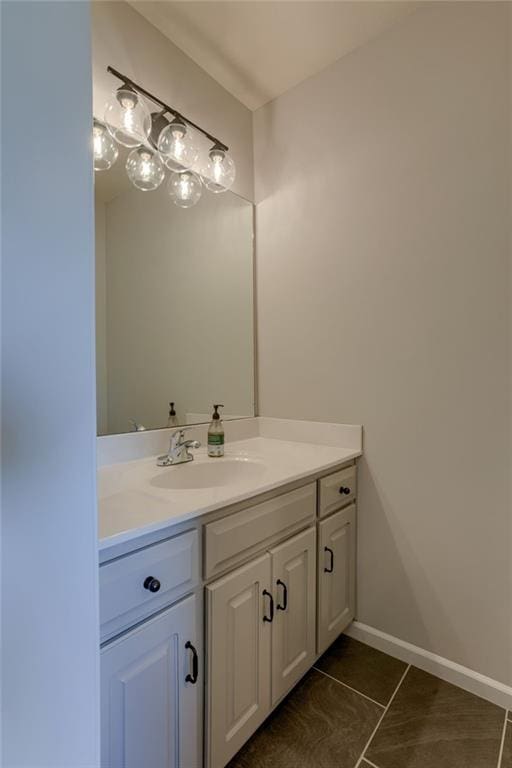 9500 N Lane Ave, Kansas City, MO 64157 - bathroom with baseboards, tile patterned flooring, and vanity